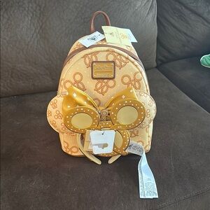 Loungefly Yellow and Brown Backpack with Bow and Intricate Pattern